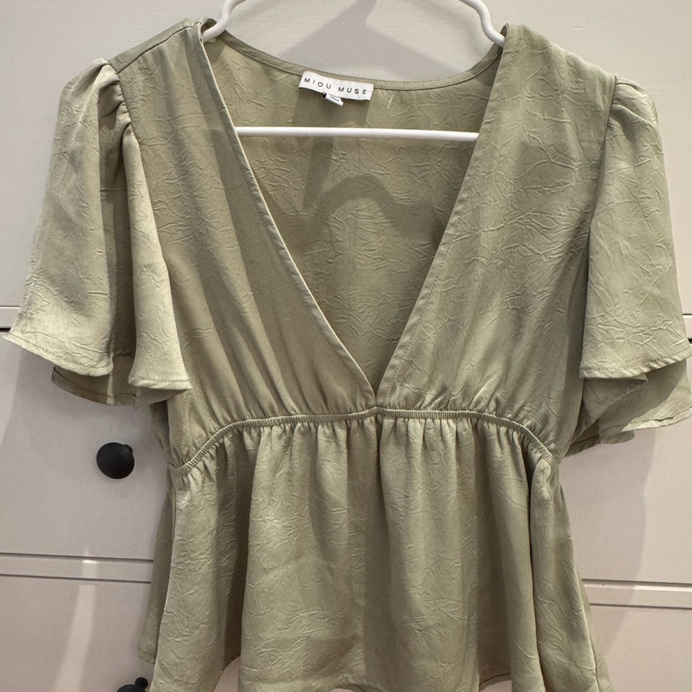 Green Ruffled Peplum Blouse with Flutter Sleeves
